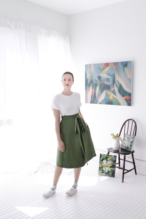 EVERYDAY BEAUTIFUL A-LINE APRON WRAP SKIRT IN MOSS GREEN LINEN