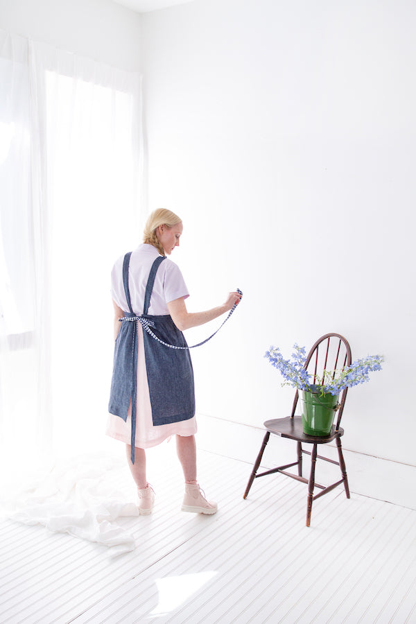 PINAFORE APRON IN INDIGO CHAMBRAY AND NAVY GINGHAM